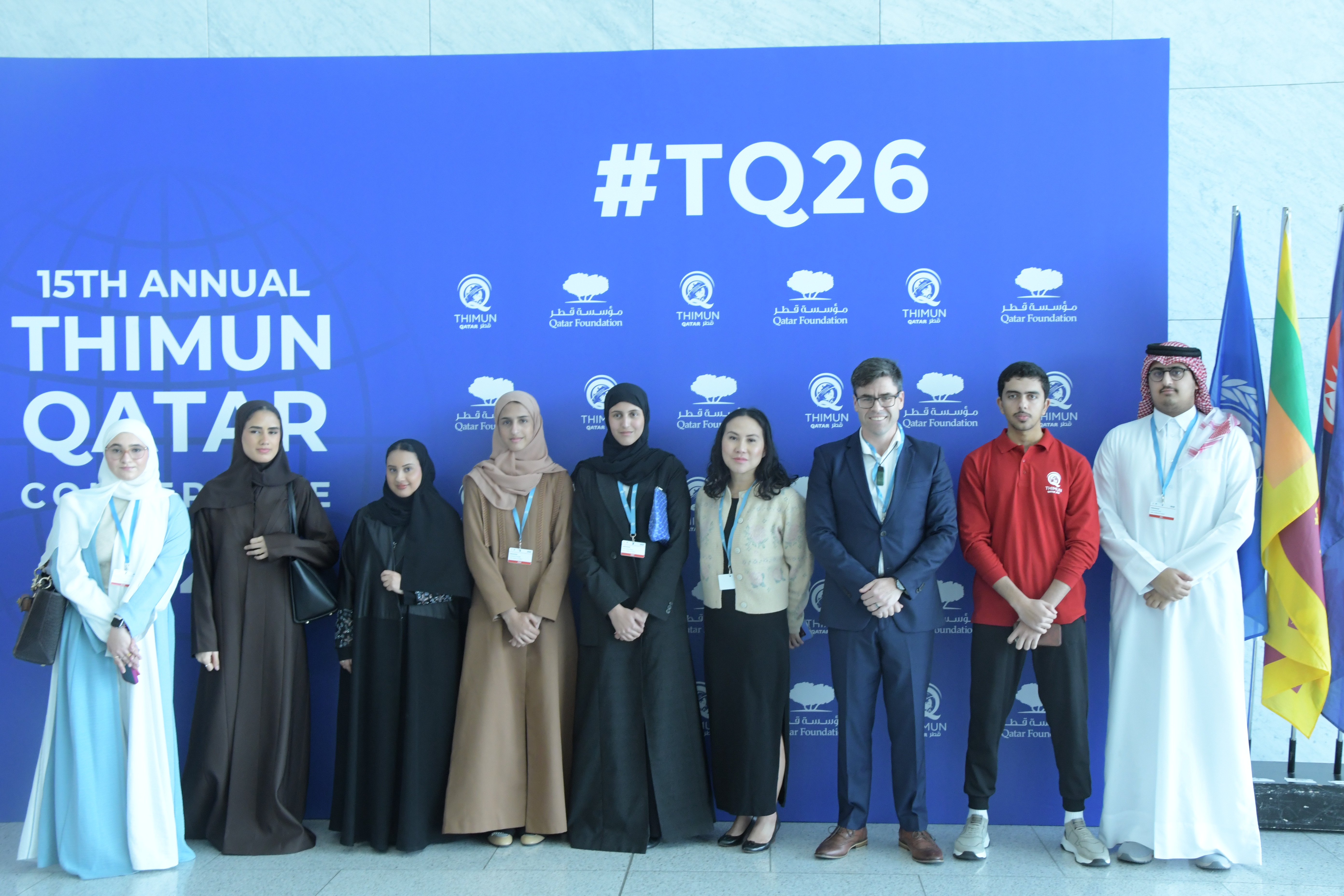 15th Annual THIMUN Qatar Conference 2026 — conference backdrop and flags